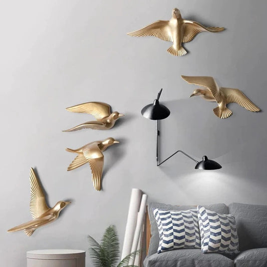 Writings on the wall hanging birds