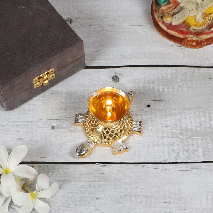 Akhand Brass Diya - Tortoise Design Writings On The Wall Diya