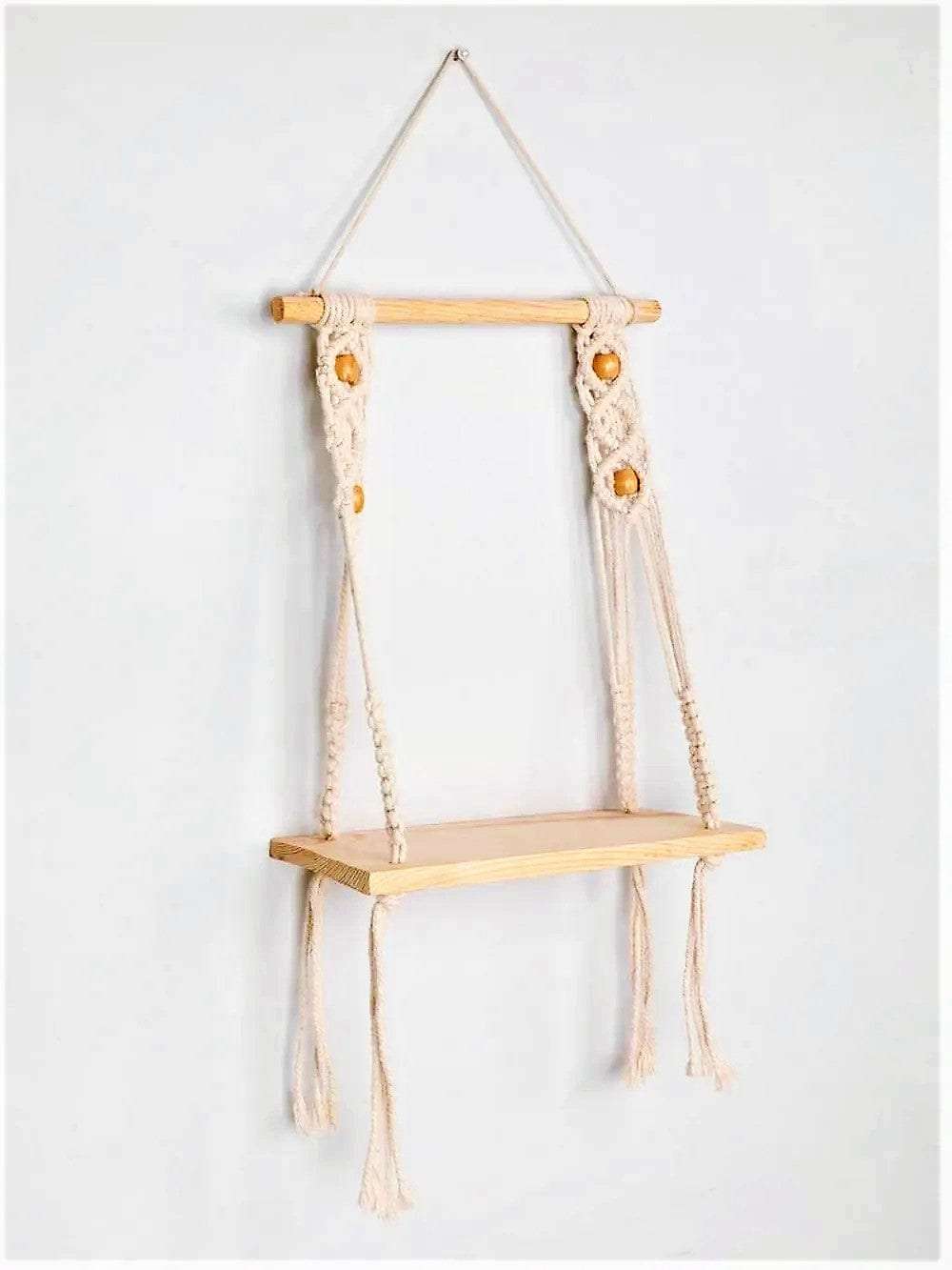 Macrame wall hanging shelf with open back chain pattern Writings On The Wall Wall Hanging