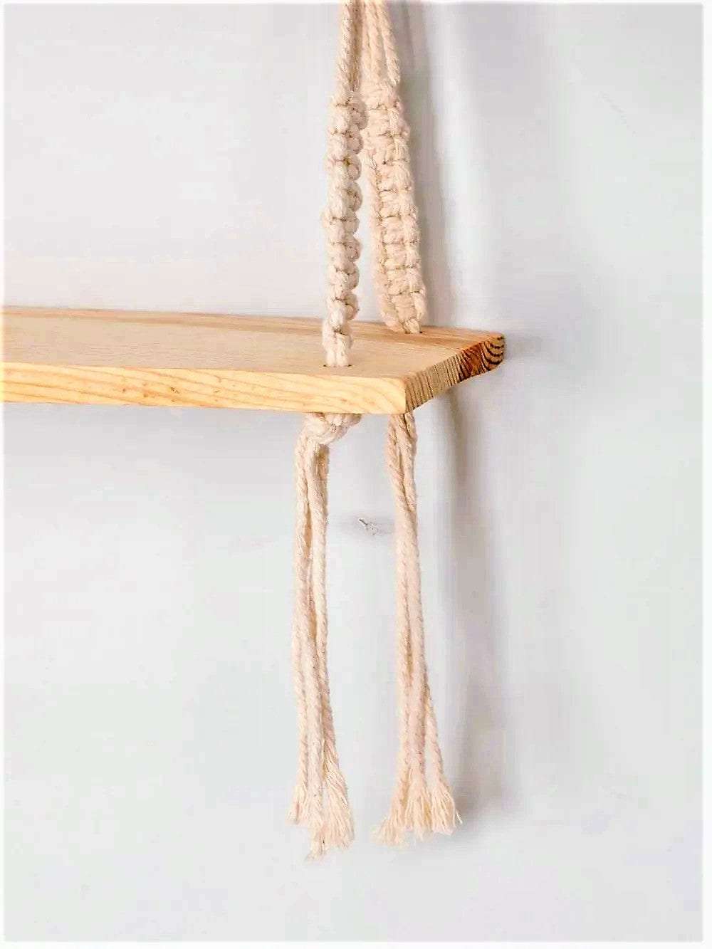 Macrame wall hanging shelf with open back chain pattern Writings On The Wall Wall Hanging