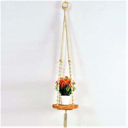 Macrame wall hanging with round shelf Writings On The Wall Wall Hanging