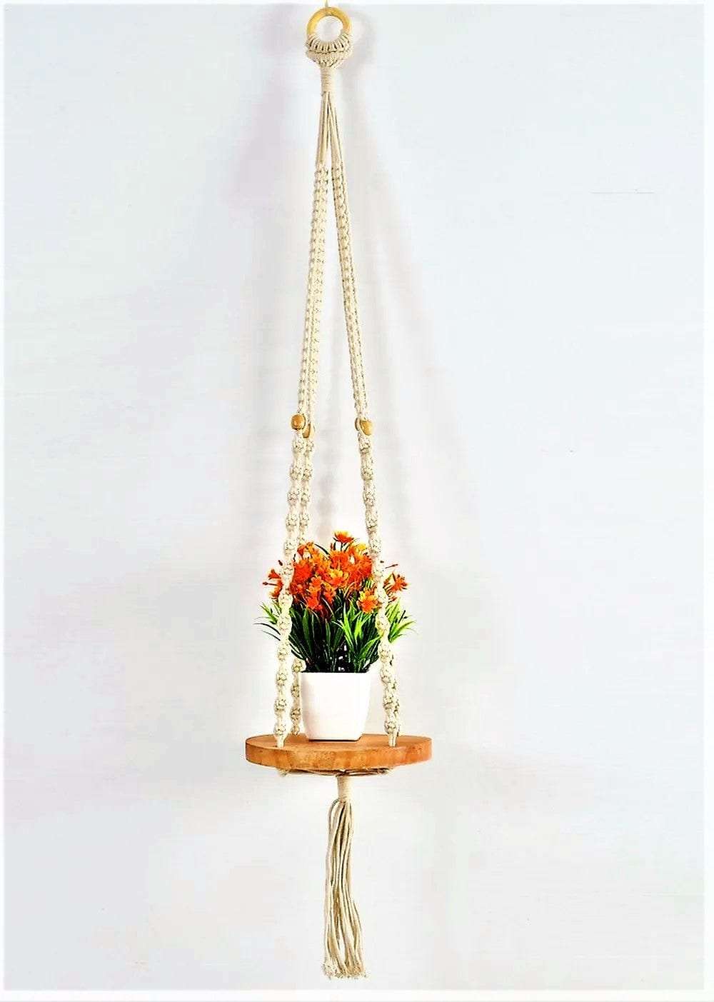 Macrame wall hanging with round shelf Writings On The Wall Wall Hanging