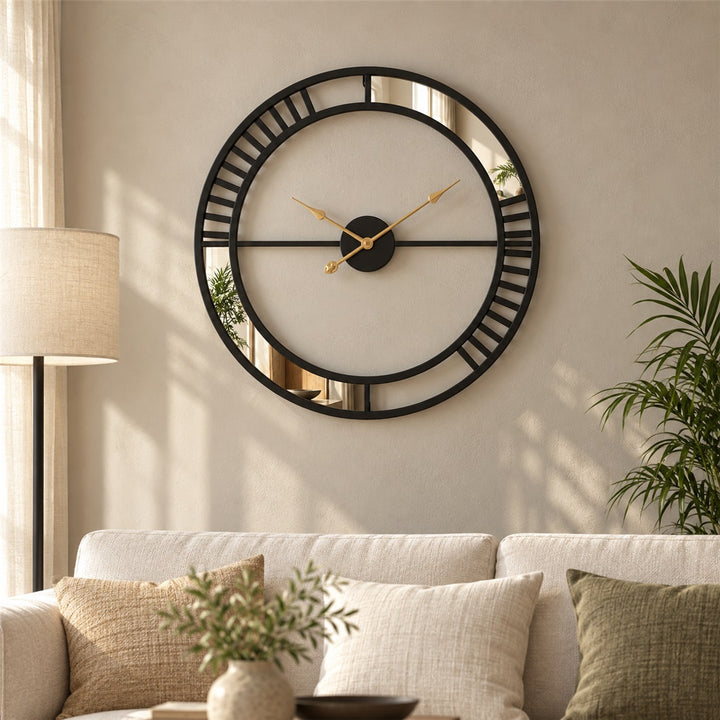 Black designer wall clock with mirror pattern in a living room