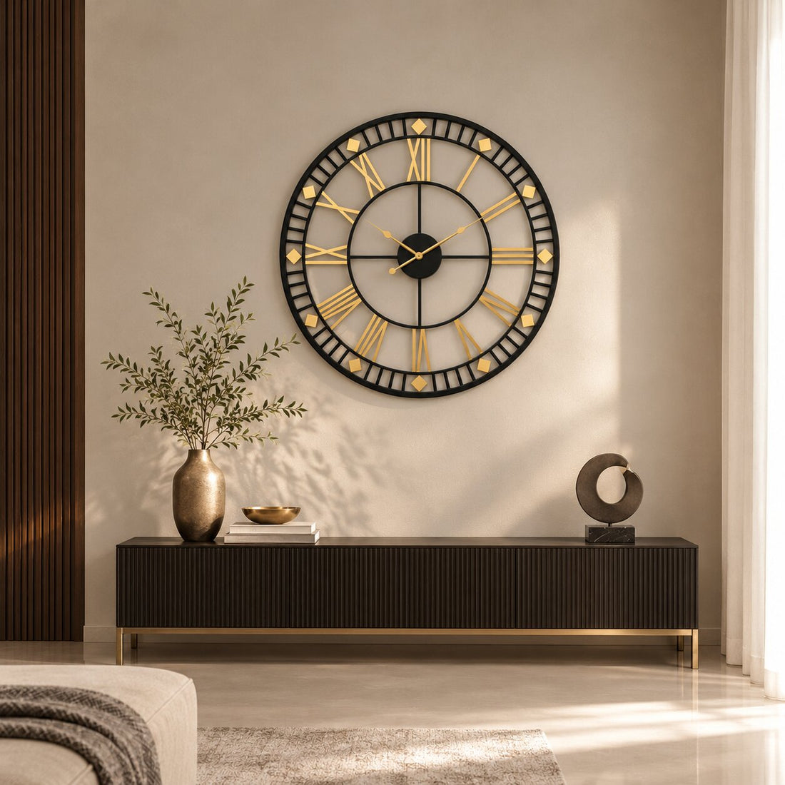 Black and gold designer wall clock above a dark sideboard in a beige living room