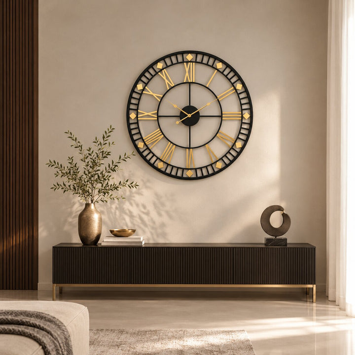 Black and gold designer wall clock above a dark sideboard in a beige living room