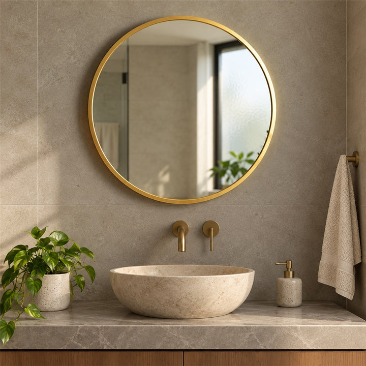 2.5 ft minimal golden round wall mirror in a bathroom